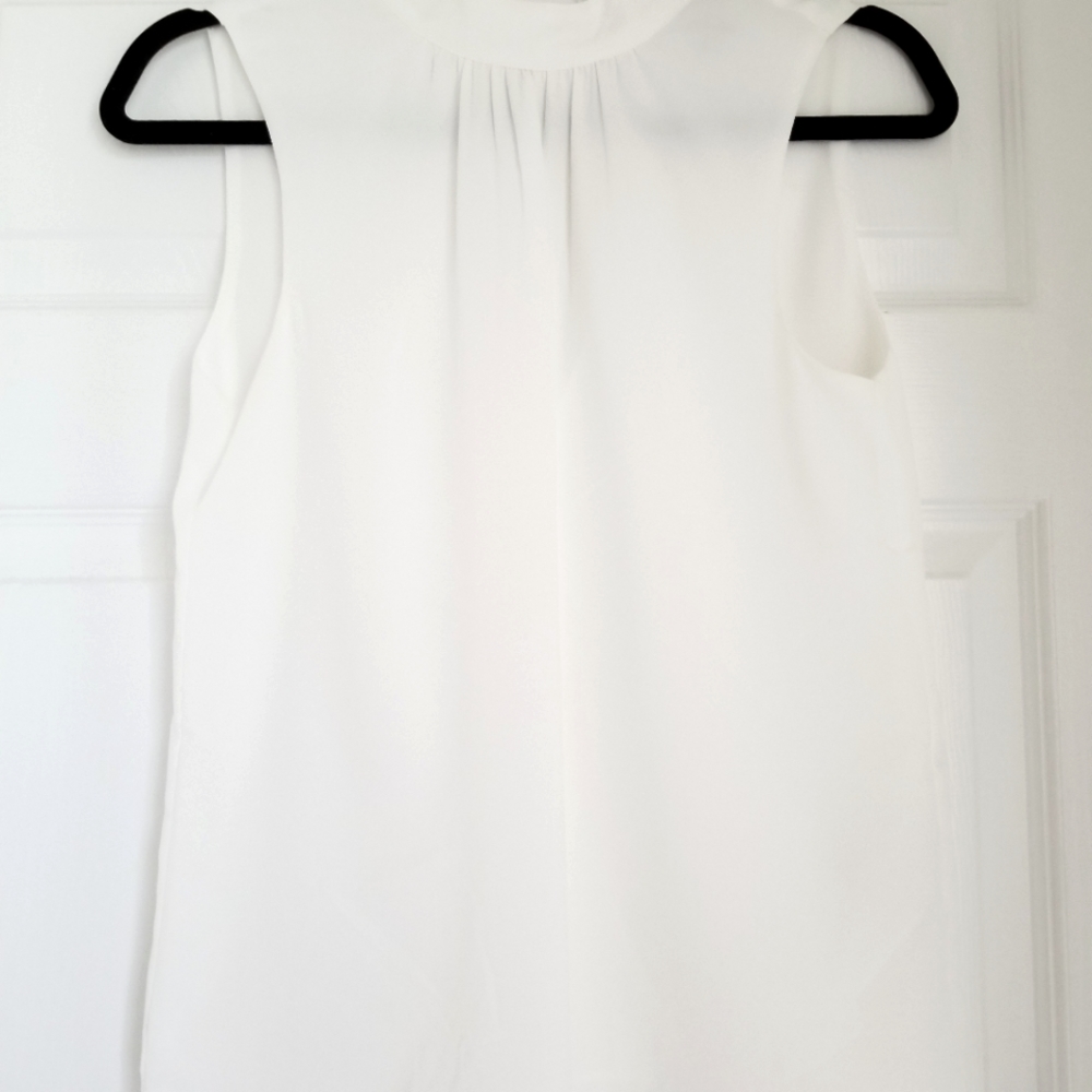 H&M sleeveless blouse, size 2, Ivory